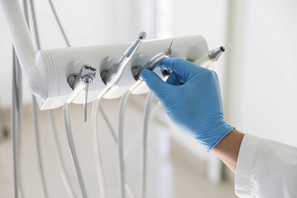 Professional Emergency Dentist technician working in Navarre Beach, FL